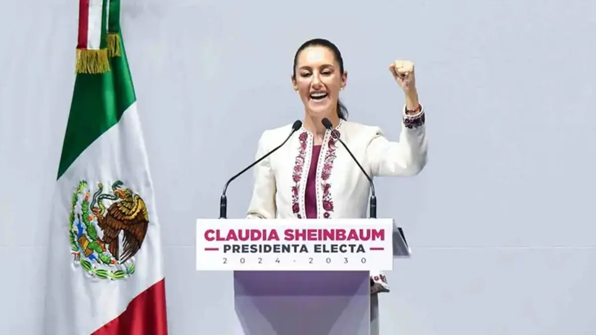 La mandataria evalúa su presencia en el evento ante protestas de diversos colectivos sociales.